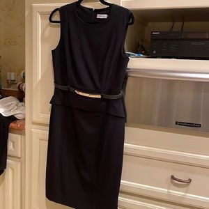 Calvin Klein little black dress with accent belt. Size 8. Never worn.